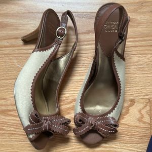 Fabric and leather sling back 2 3/4 in heel.
